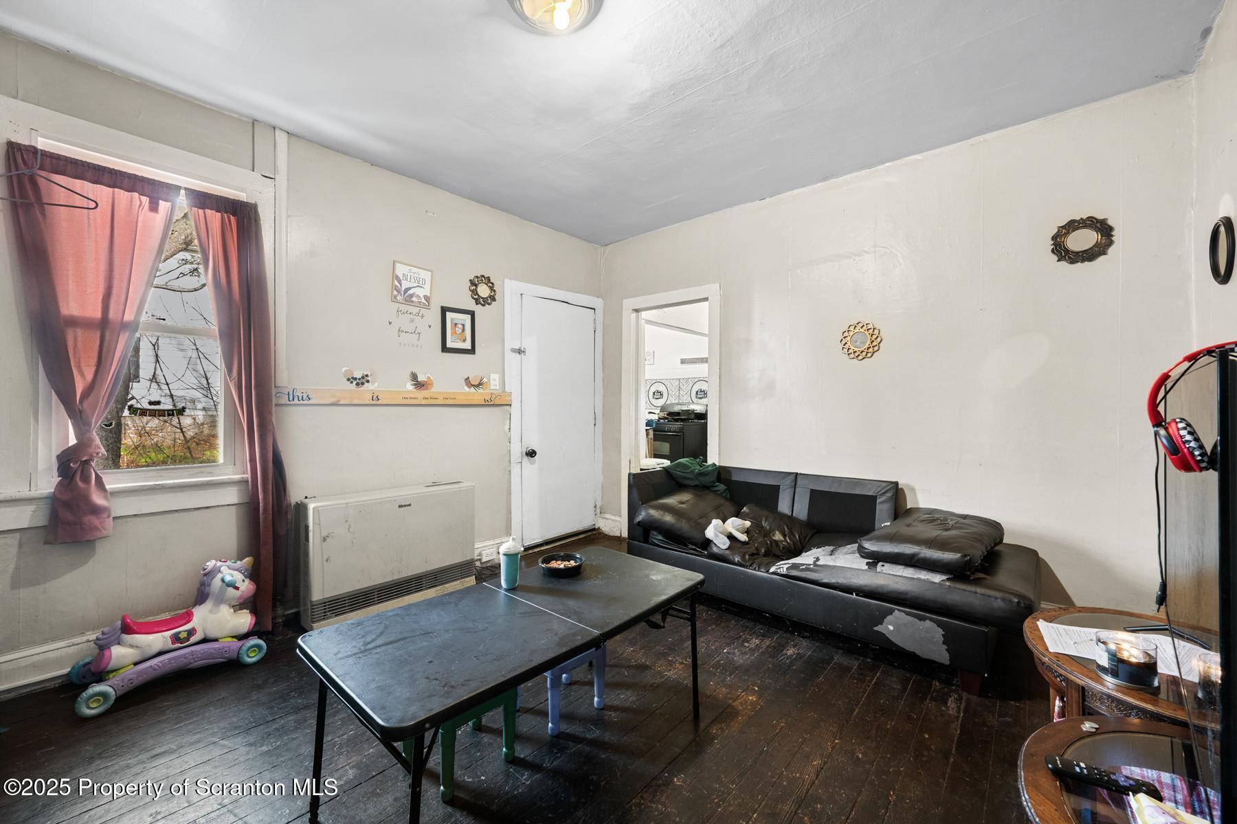 1019 South Webster Avenue Scranton, PA 18505 - Photo 27 of 36 a room with furniture and air hockey table