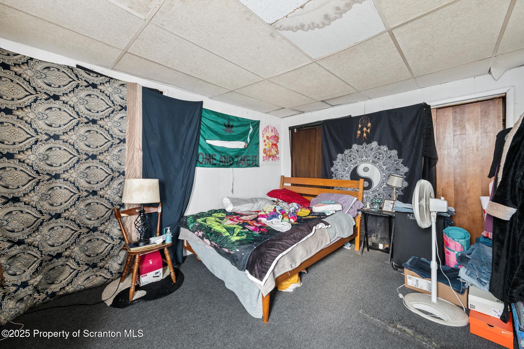 1019 South Webster Avenue Scranton, PA 18505 - Photo 33 of 36 a bedroom with furniture and a flat screen tv