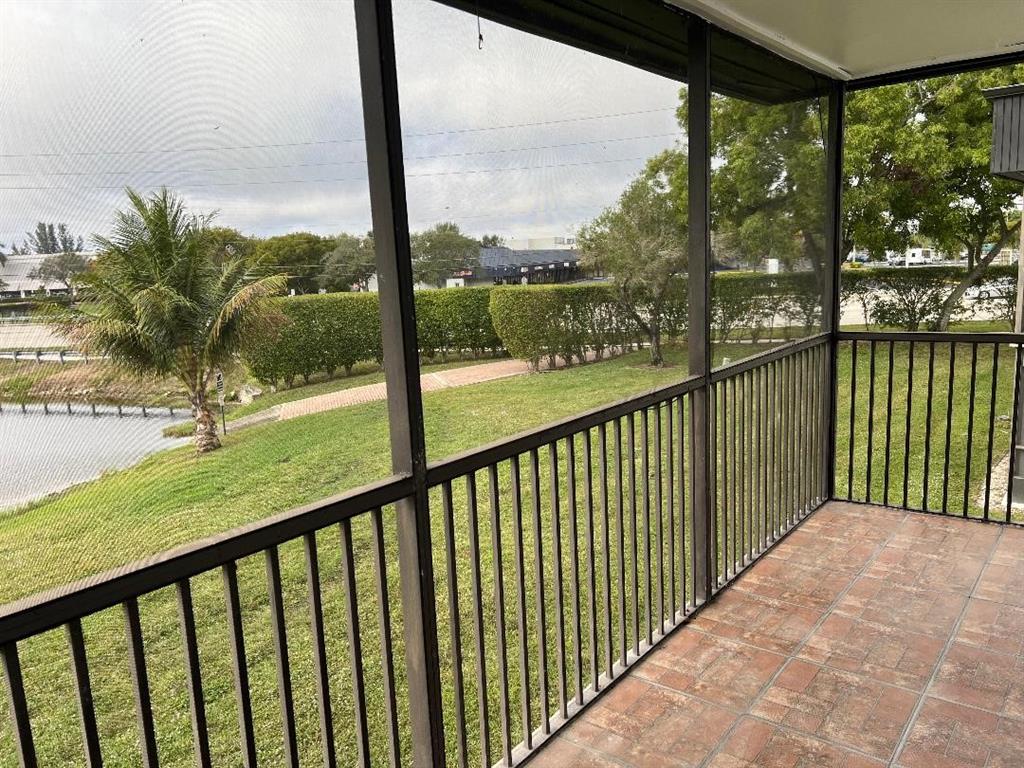 9920 Northwest 68th Place, Unit 210 Tamarac, FL 33321 - Photo 18 of 26 a view of city from a balcony