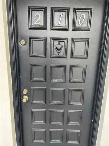 a view of a hallway with windows