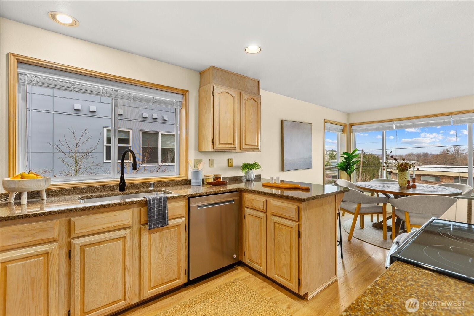 233 3rd Avenue South, Unit 305 Edmonds, WA 98020 - Photo 16 of 34 a view of a kitchen with cabinets