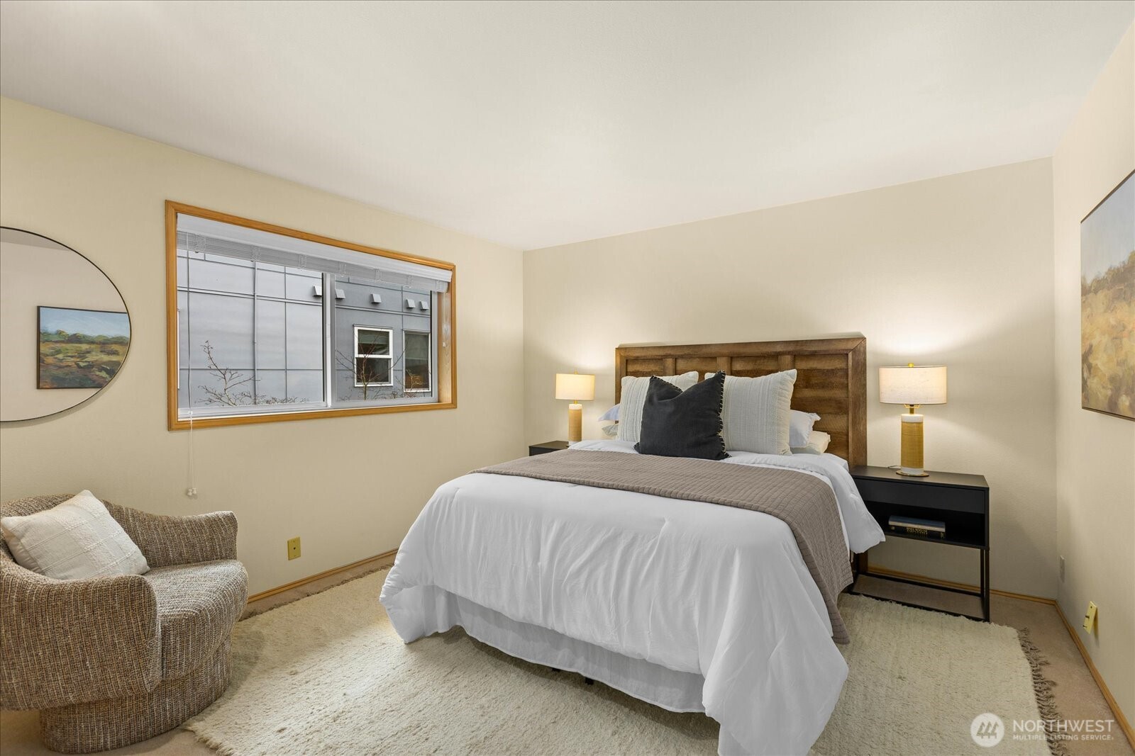 233 3rd Avenue South, Unit 305 Edmonds, WA 98020 - Photo 25 of 34 a bedroom with bed and window