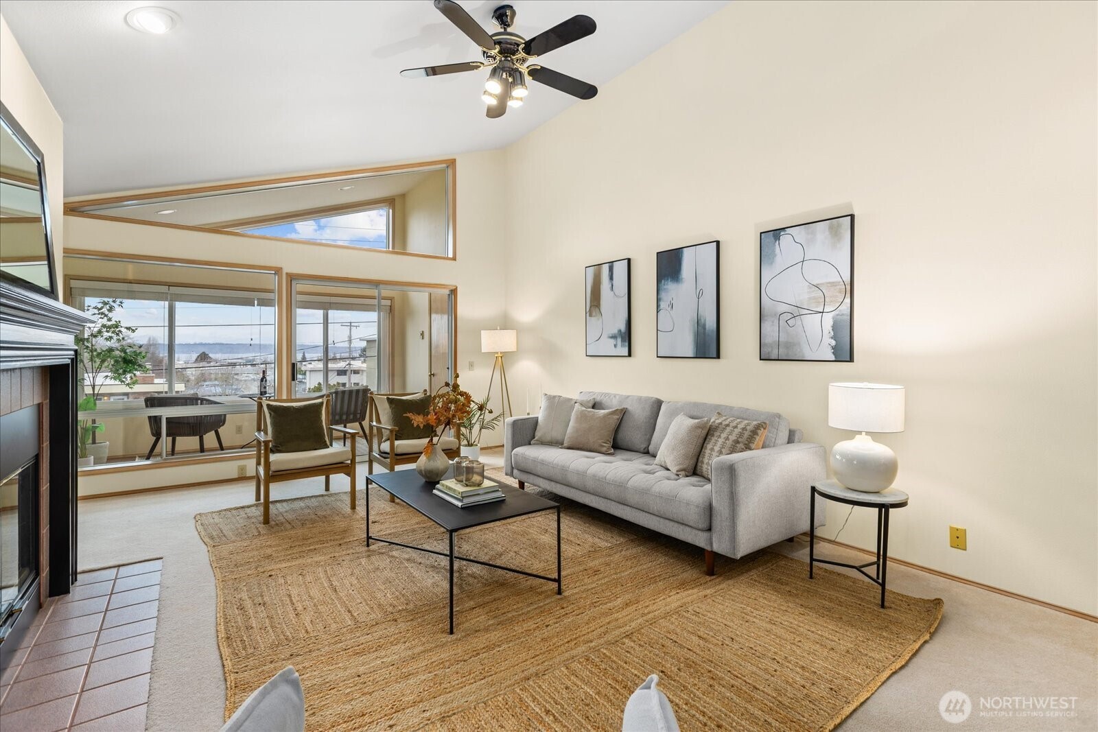 233 3rd Avenue South, Unit 305 Edmonds, WA 98020 - Photo 6 of 34 a living room with furniture and a window