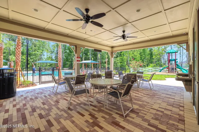 a view of a park with a slide