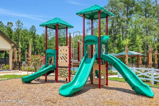 a view of yard with swimming pool