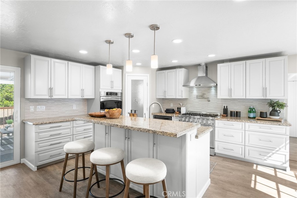 2146 Cowper Street Cambria, CA 93428 - Photo 12 of 46 Formal Dining Area as well as eat-in kitchen with breakfast bar/stools area