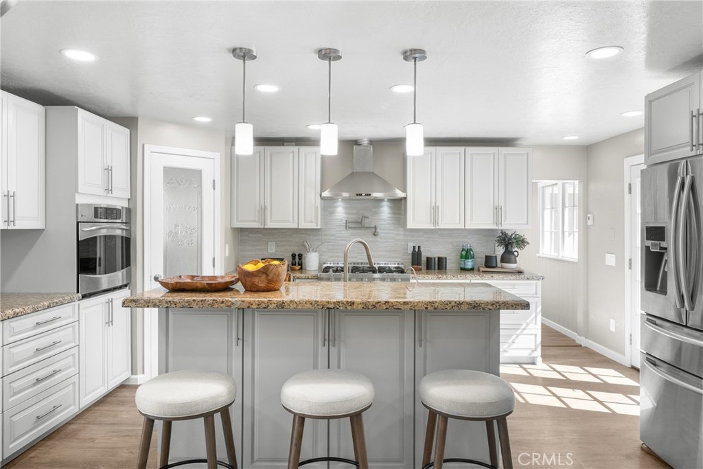 2146 Cowper Street Cambria, CA 93428 - Photo 13 of 46 Updated Kitchen with island, custom cabinets, professional range etc.