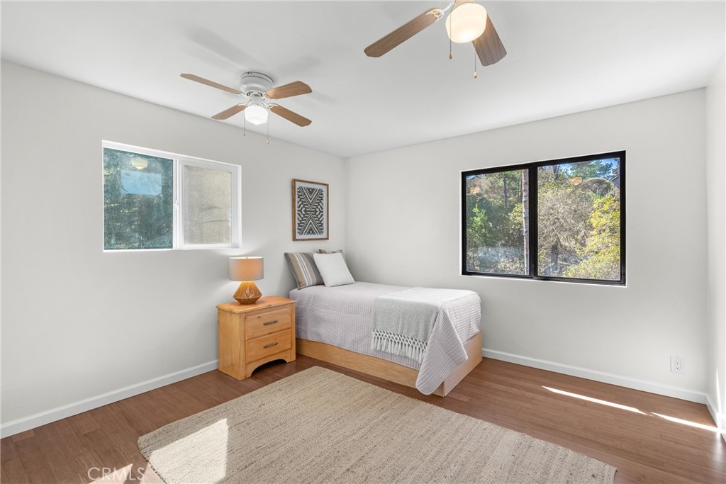 2146 Cowper Street Cambria, CA 93428 - Photo 22 of 46 Guest Bedroom 2, large enough for 2 beds and has 2 ceiling fans