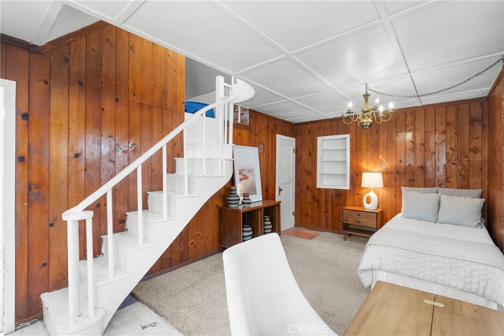 2146 Cowper Street Cambria, CA 93428 - Photo 29 of 46 The Historical Original Cabin with loft from the 1930's could easily be converted to an attached but separate attached rentable apartment with it's own entrance and full bath and kitchenette. Or would also make a charming office or... ?