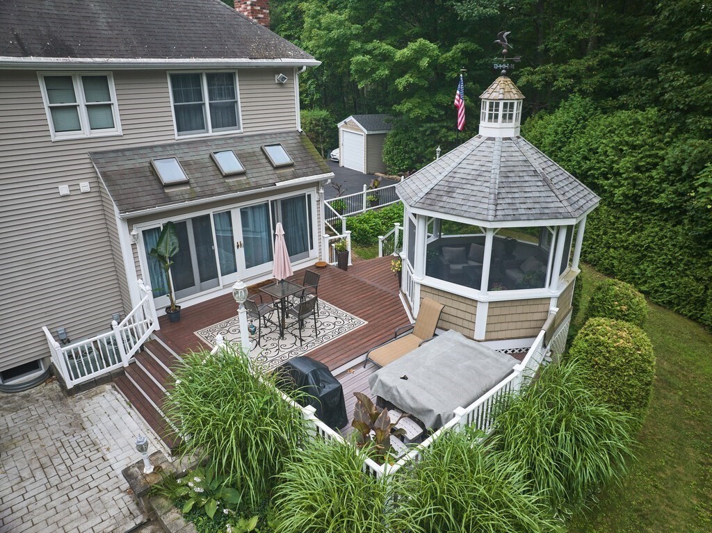 9 Santom Street Auburn, MA 01501 - Photo 36 of 42 front view of a house with a yard
