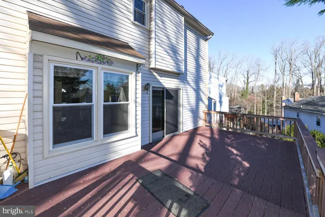 a view of balcony with wooden floor
