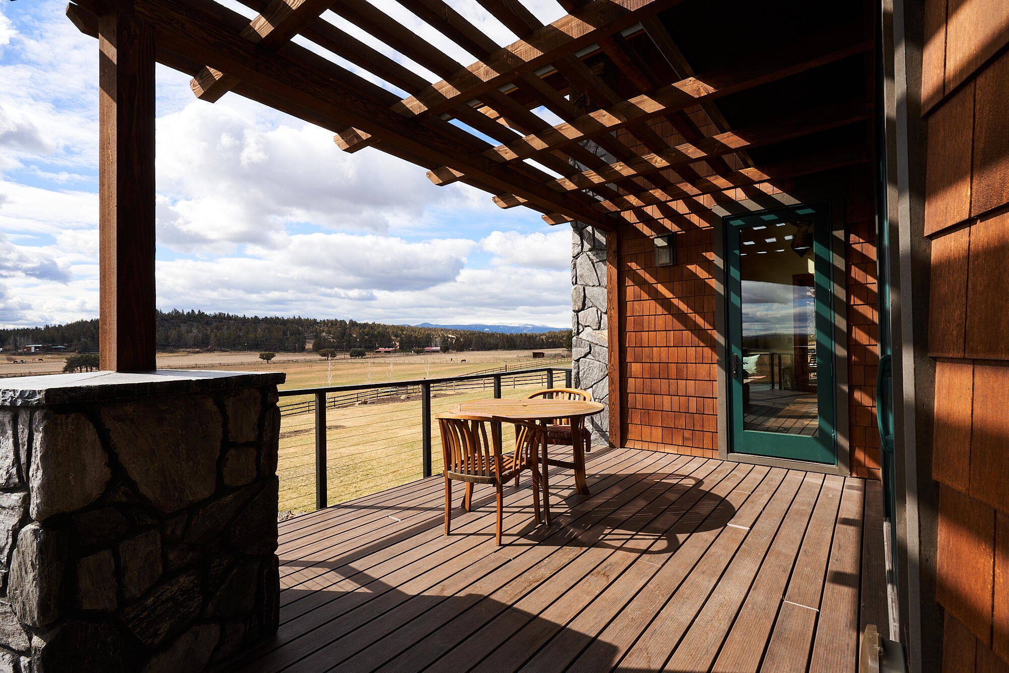 19525 Innes Market Road Bend, OR 97703 - Photo 27 of 56 The main home's decks are covered with pergolas to shade from the Central Oregon sun.