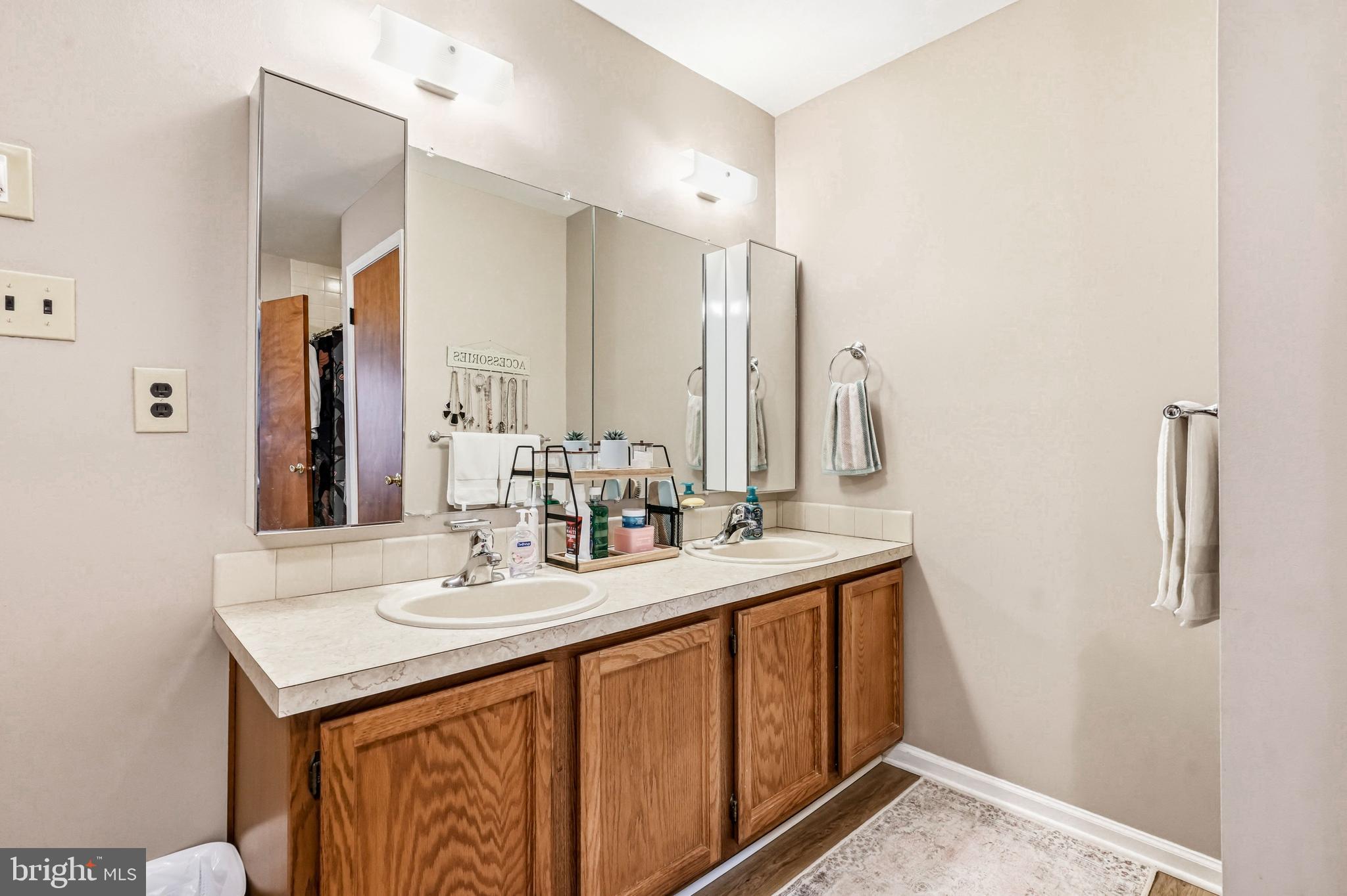 26 Blue Jay Drive Clementon, NJ 08021 - Photo 31 of 48 a bathroom with a sink and a mirror