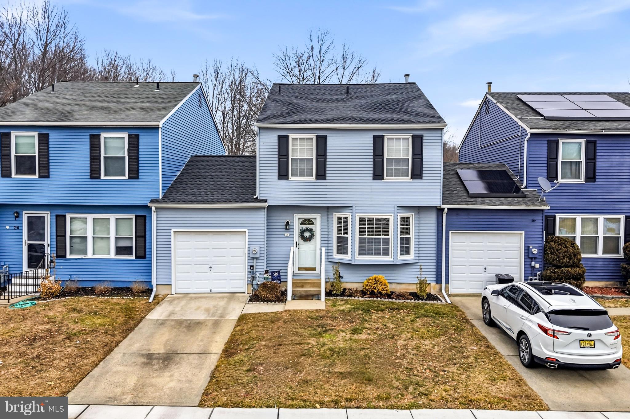 26 Blue Jay Drive Clementon, NJ 08021 - Photo 4 of 48 a front view of a house with a yard