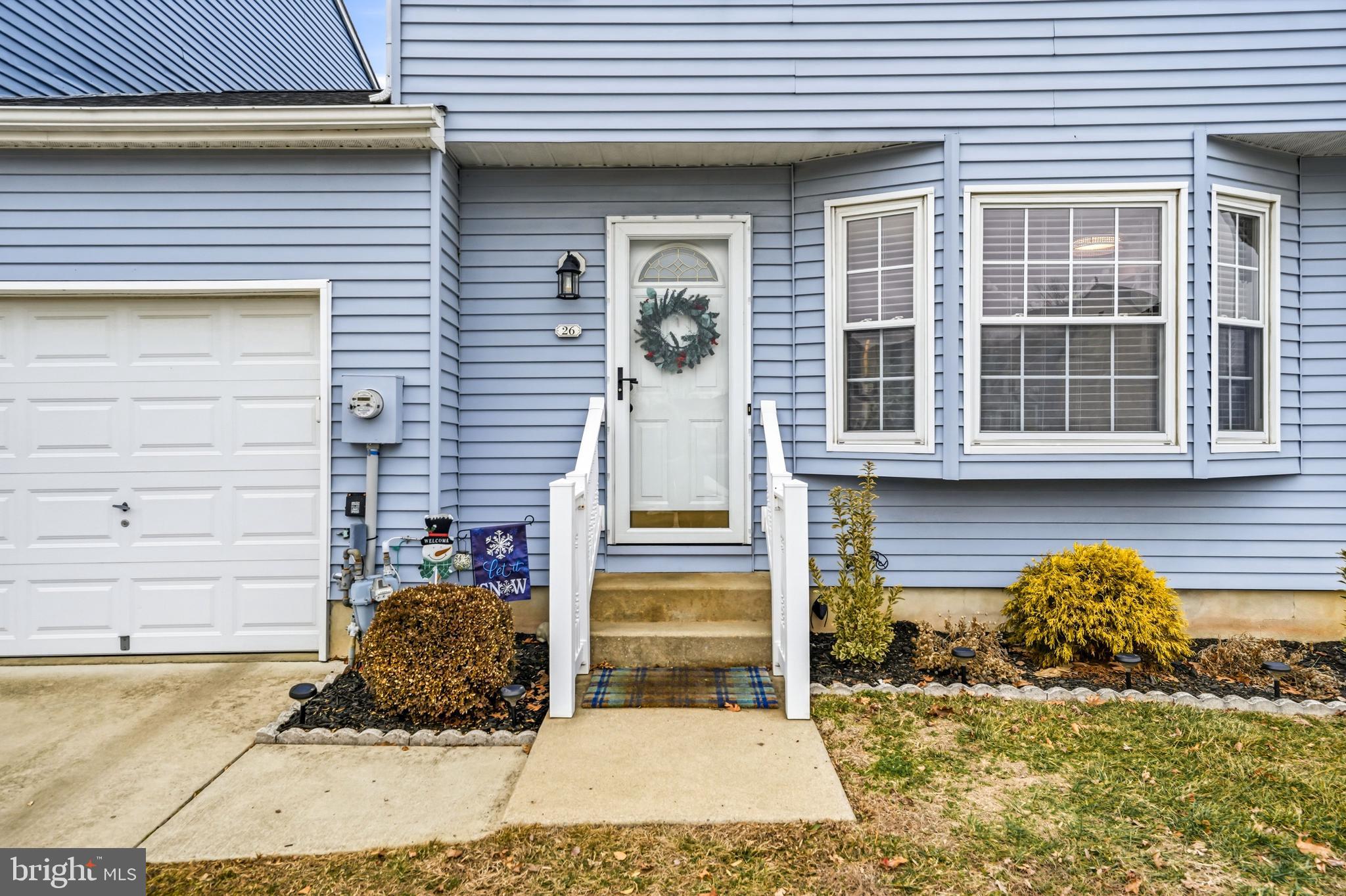 26 Blue Jay Drive Clementon, NJ 08021 - Photo 6 of 48 a front view of a house with a yard