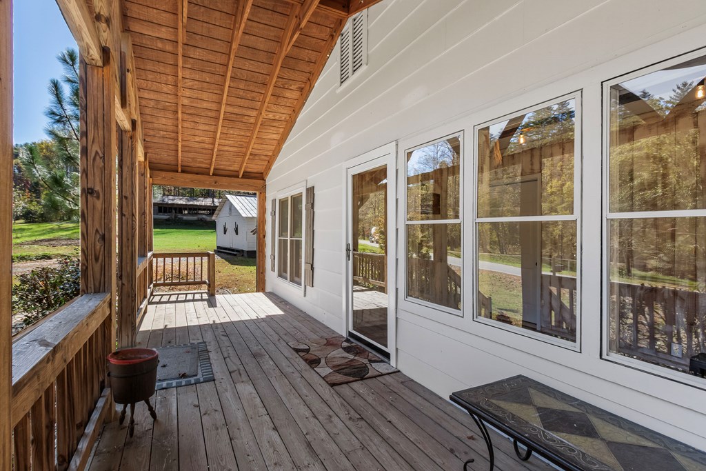 3391 Candy Mountain Road Murphy, NC 28906 - Photo 12 of 59 a view of a balcony with wooden floor