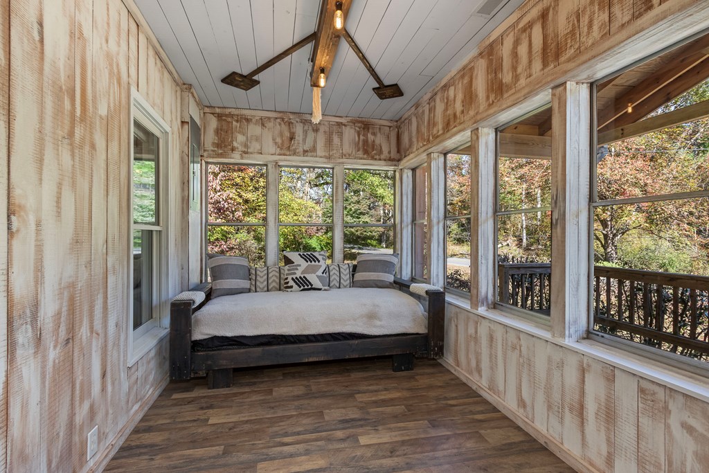 3391 Candy Mountain Road Murphy, NC 28906 - Photo 14 of 59 a bedroom with a bed and a large window