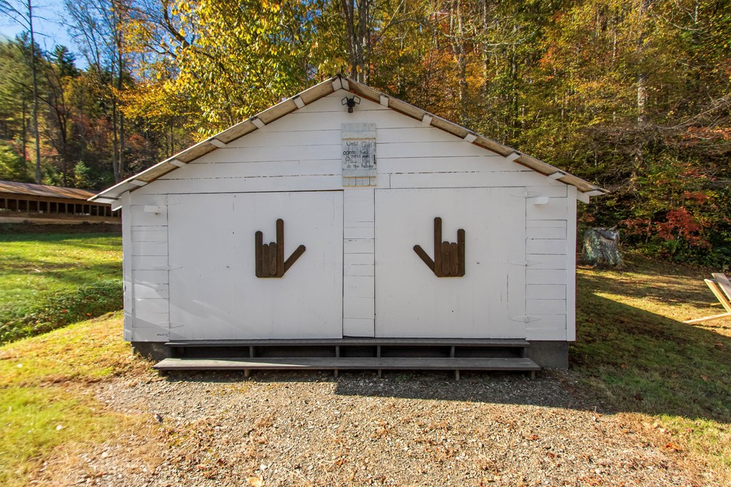 3391 Candy Mountain Road Murphy, NC 28906 - Photo 41 of 59 a front view of a house with garden
