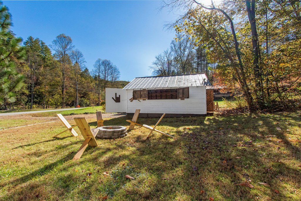 3391 Candy Mountain Road Murphy, NC 28906 - Photo 43 of 59 a view of a swimming pool with a patio