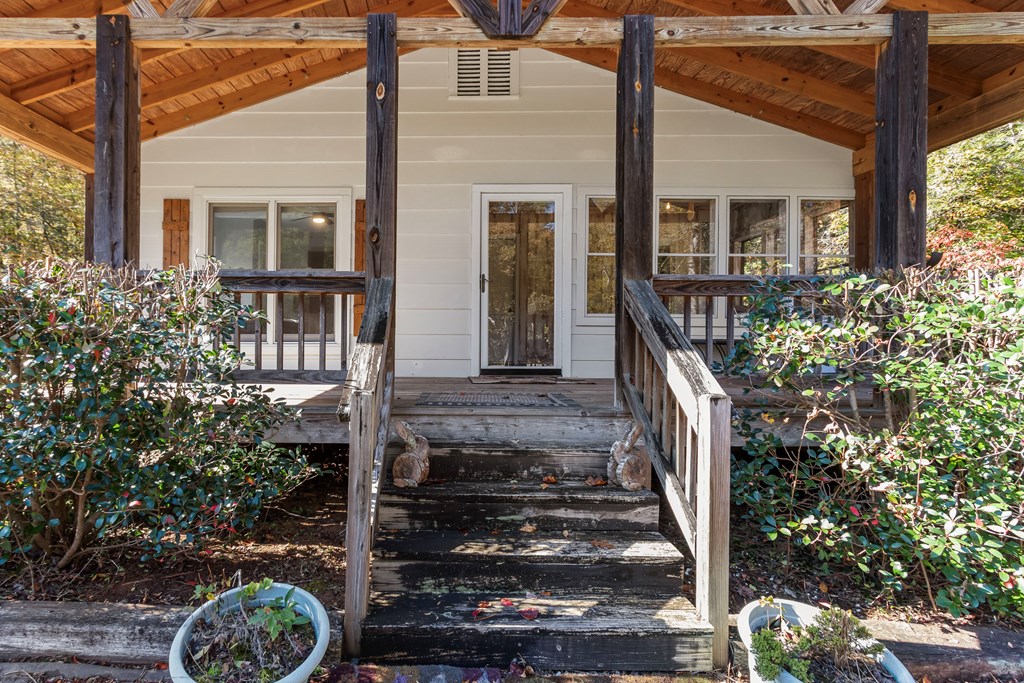 3391 Candy Mountain Road Murphy, NC 28906 - Photo 9 of 59 front view of a house with a potted plant
