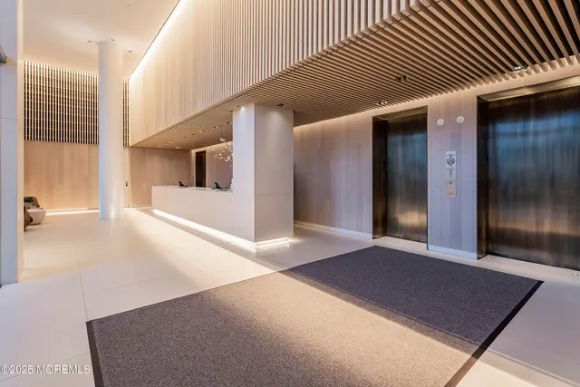 wooden floor in a hall with an entryway