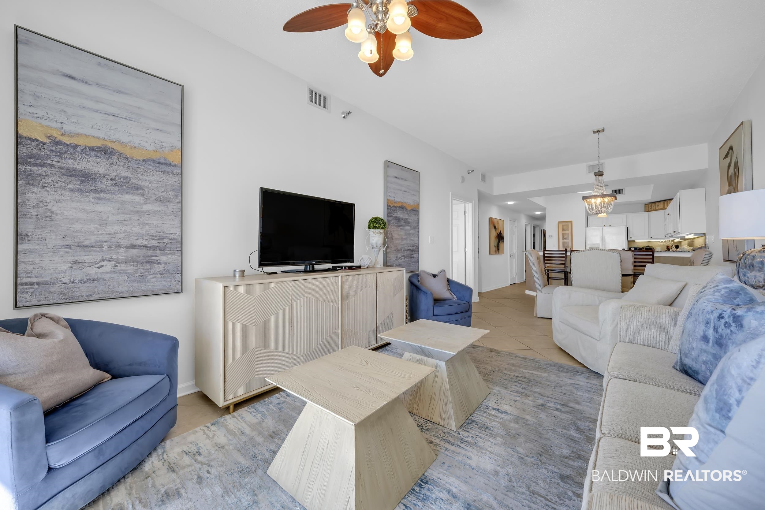 27282 Canal Road, Unit 104 Orange Beach, AL 36561 - Photo 24 of 79 Tiled living room featuring a ceiling fan