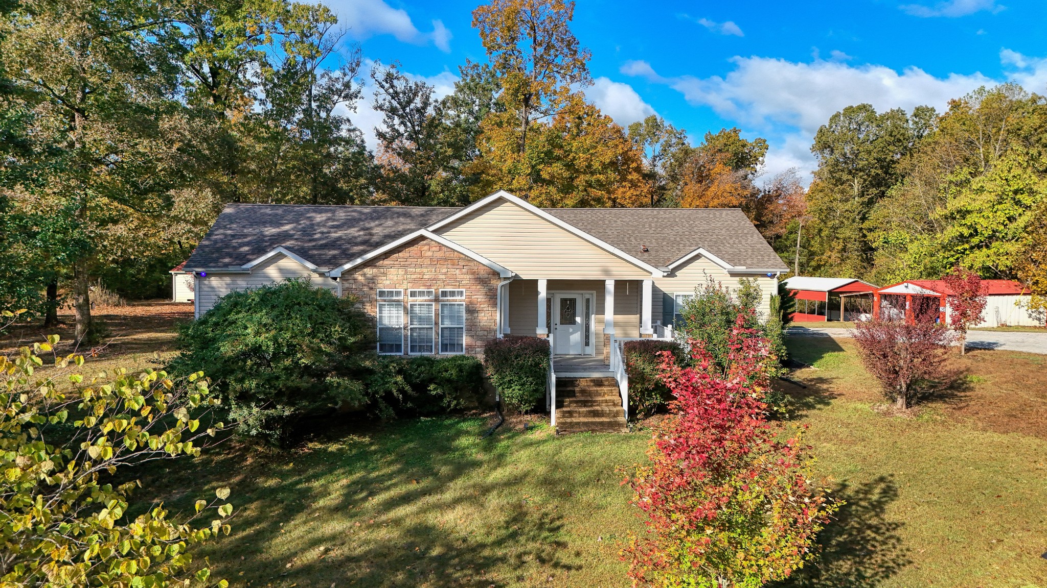 555 Brandon Road Huntingdon, TN 38344 - Photo 11 of 42 a view of a house with a yard and sitting area