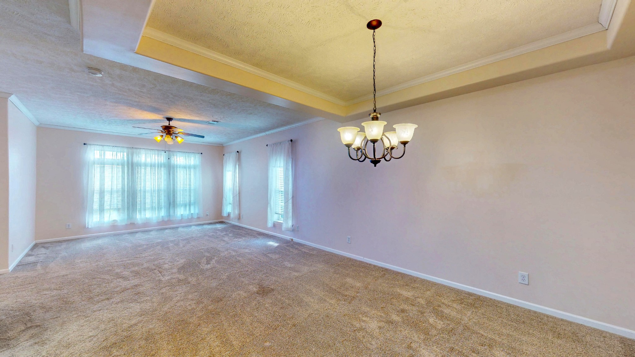 555 Brandon Road Huntingdon, TN 38344 - Photo 22 of 42 a view of a livingroom with a chandelier furniture and windows