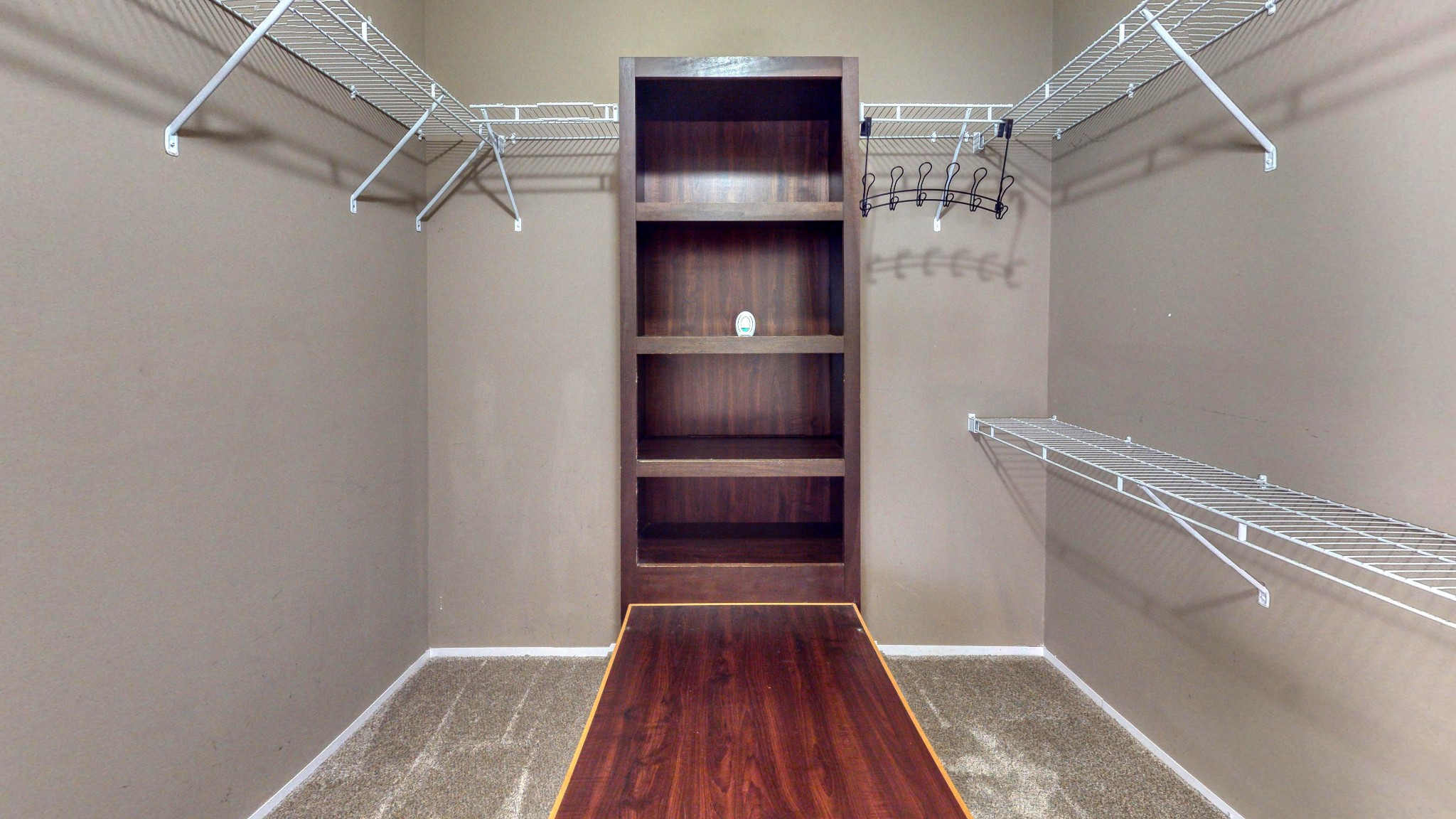 555 Brandon Road Huntingdon, TN 38344 - Photo 27 of 42 a view of walk in closet with wooden floor