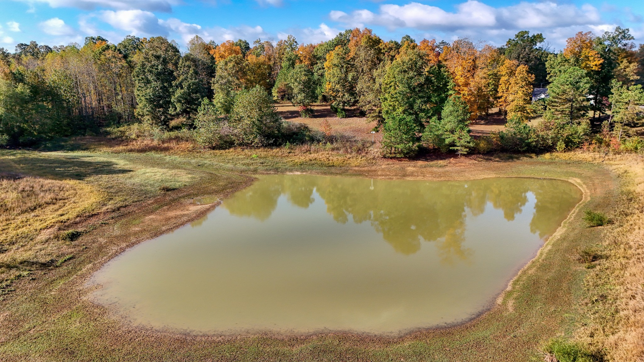 555 Brandon Road Huntingdon, TN 38344 - Photo 10 of 42 a view of a swimming pool with an outdoor space and seating area