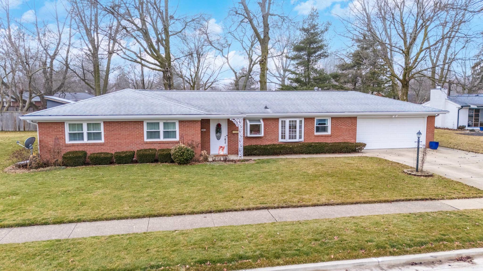 a view of a yard in front of a house