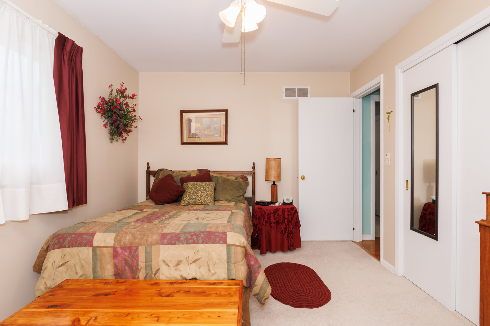 305 Granada Road Bloomington, IL 61701 - Photo 24 of 36 a bedroom with a bed and a painting on the wall