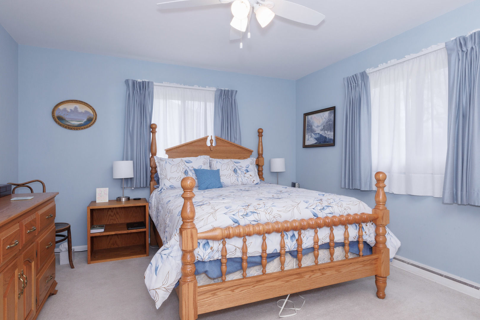 305 Granada Road Bloomington, IL 61701 - Photo 25 of 36 a bedroom with a bed and a table in it