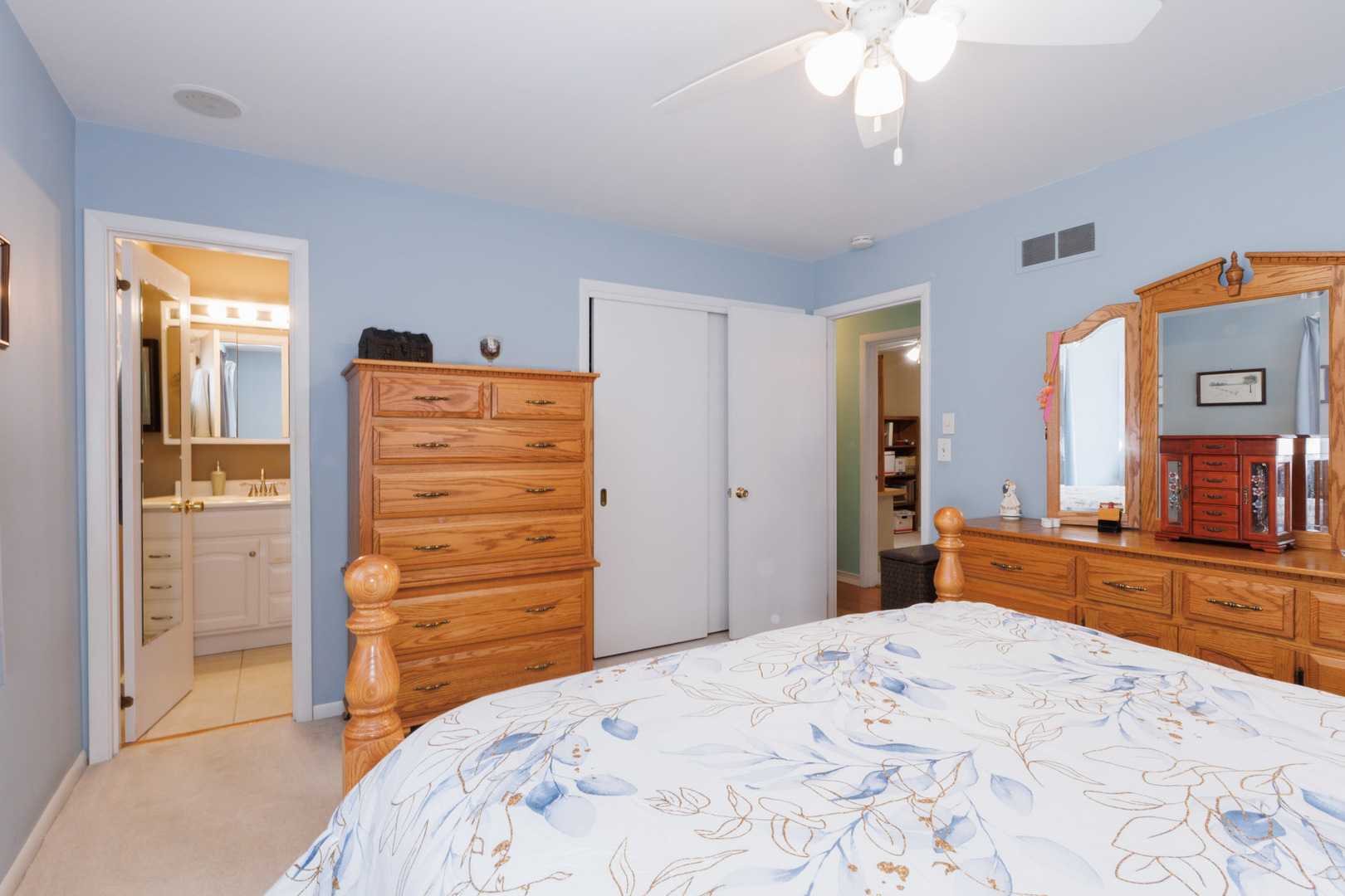 305 Granada Road Bloomington, IL 61701 - Photo 26 of 36 a bedroom with a bed and a dresser