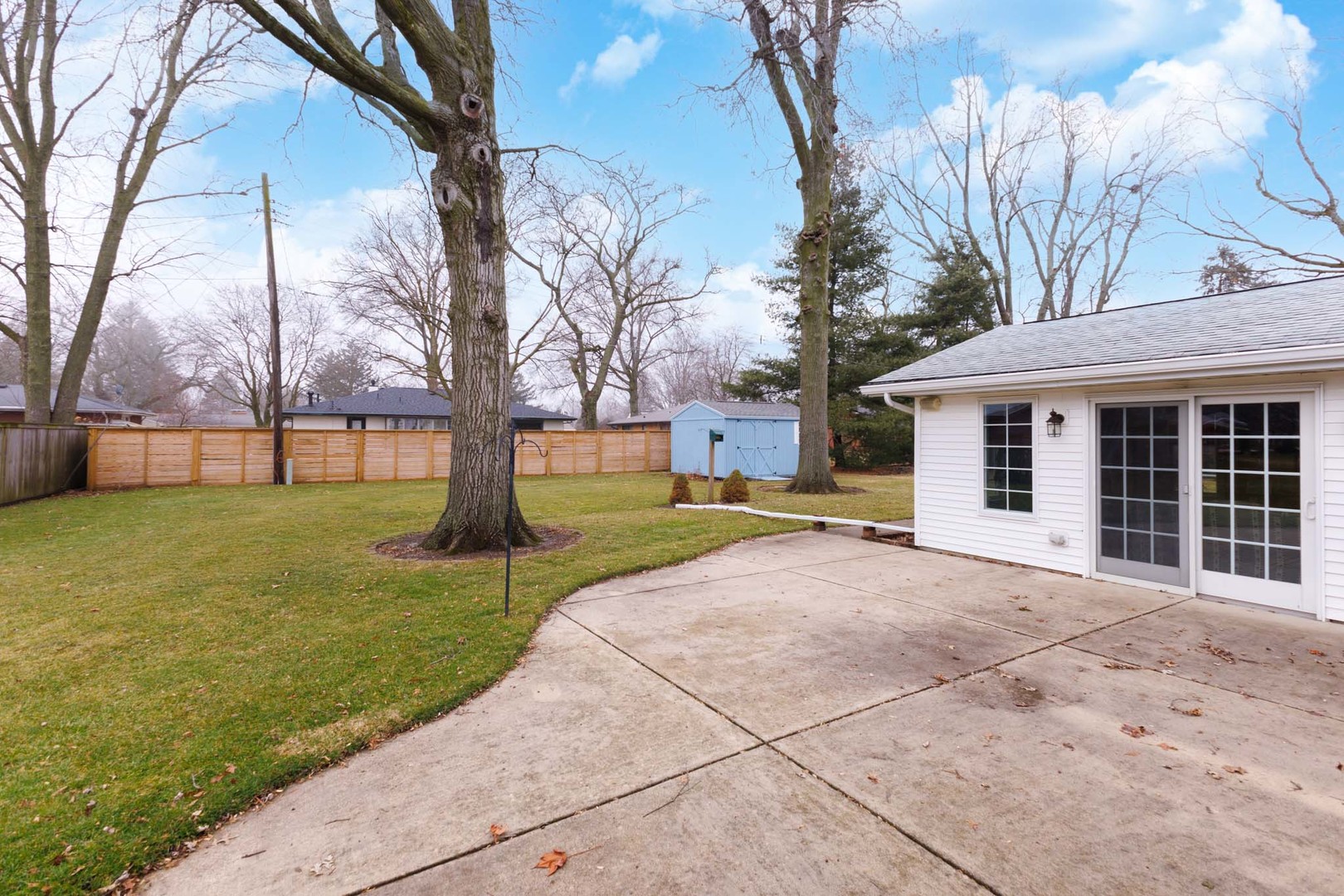 305 Granada Road Bloomington, IL 61701 - Photo 28 of 36 a view of a house with a backyard
