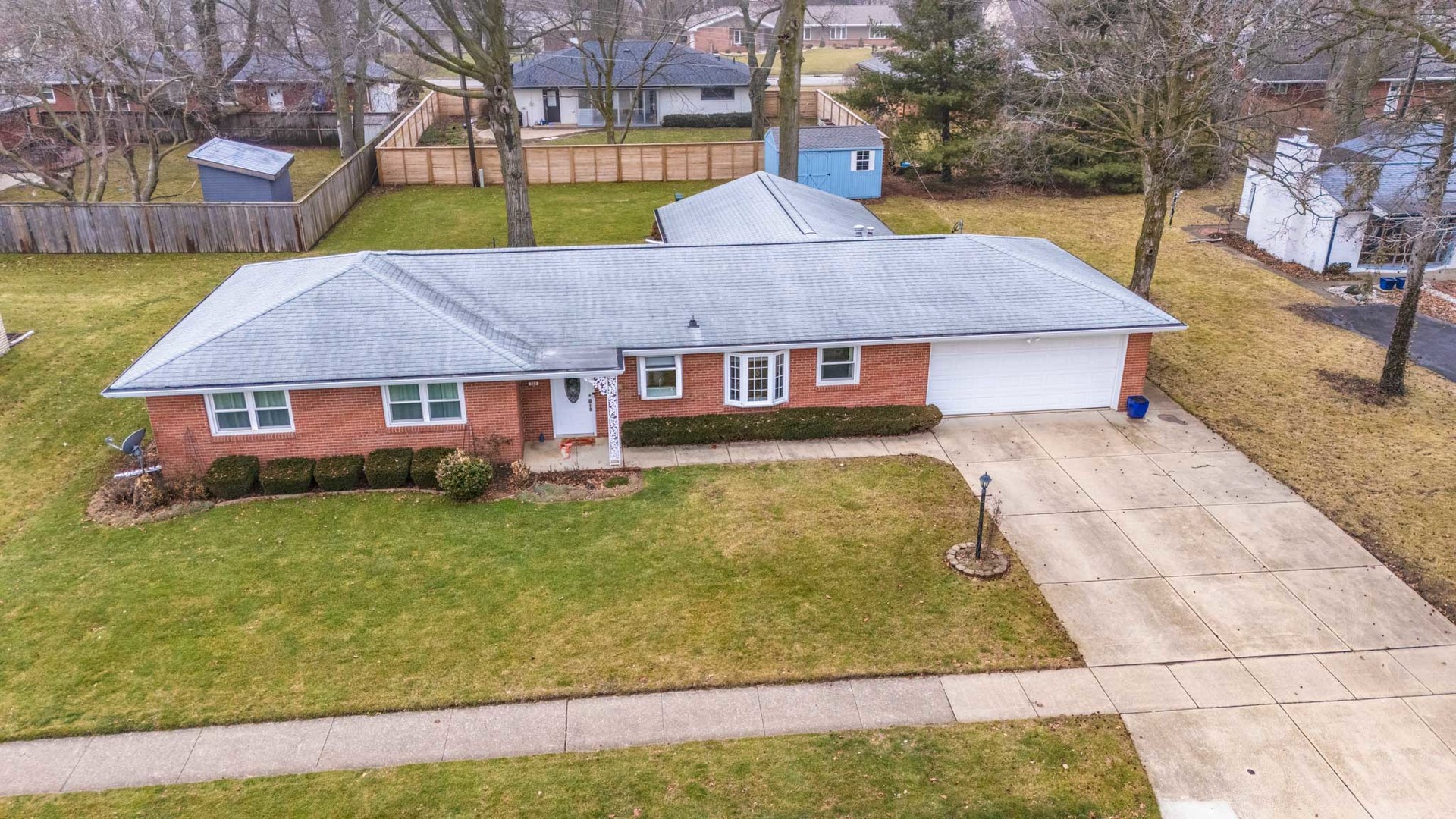 305 Granada Road Bloomington, IL 61701 - Photo 35 of 36 a aerial view of a house with swimming pool