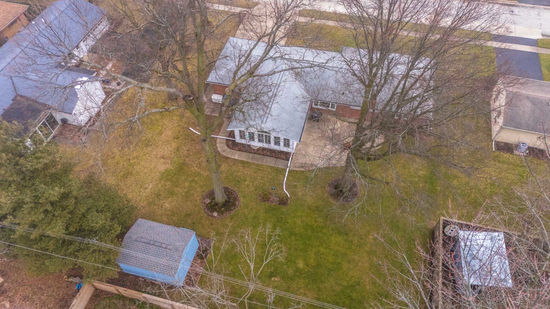 305 Granada Road Bloomington, IL 61701 - Photo 36 of 36 a sign that is sitting on a brick wall