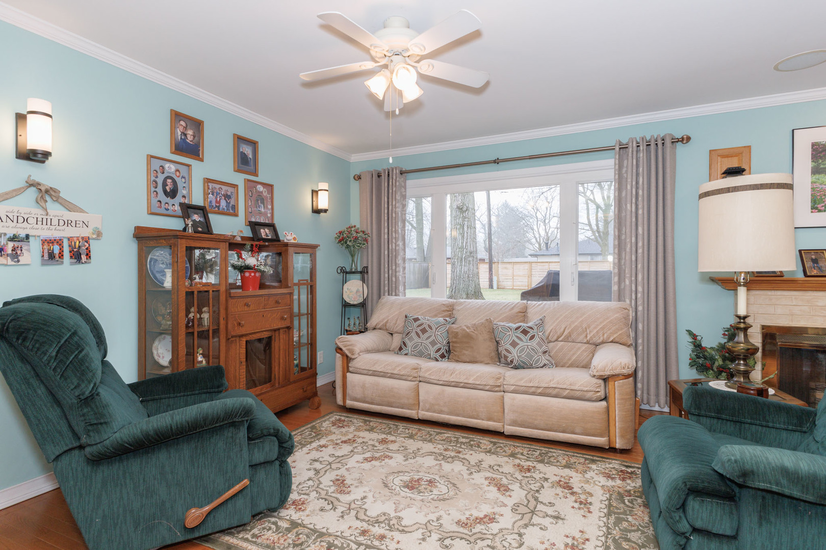 305 Granada Road Bloomington, IL 61701 - Photo 6 of 36 a living room with furniture and a large window