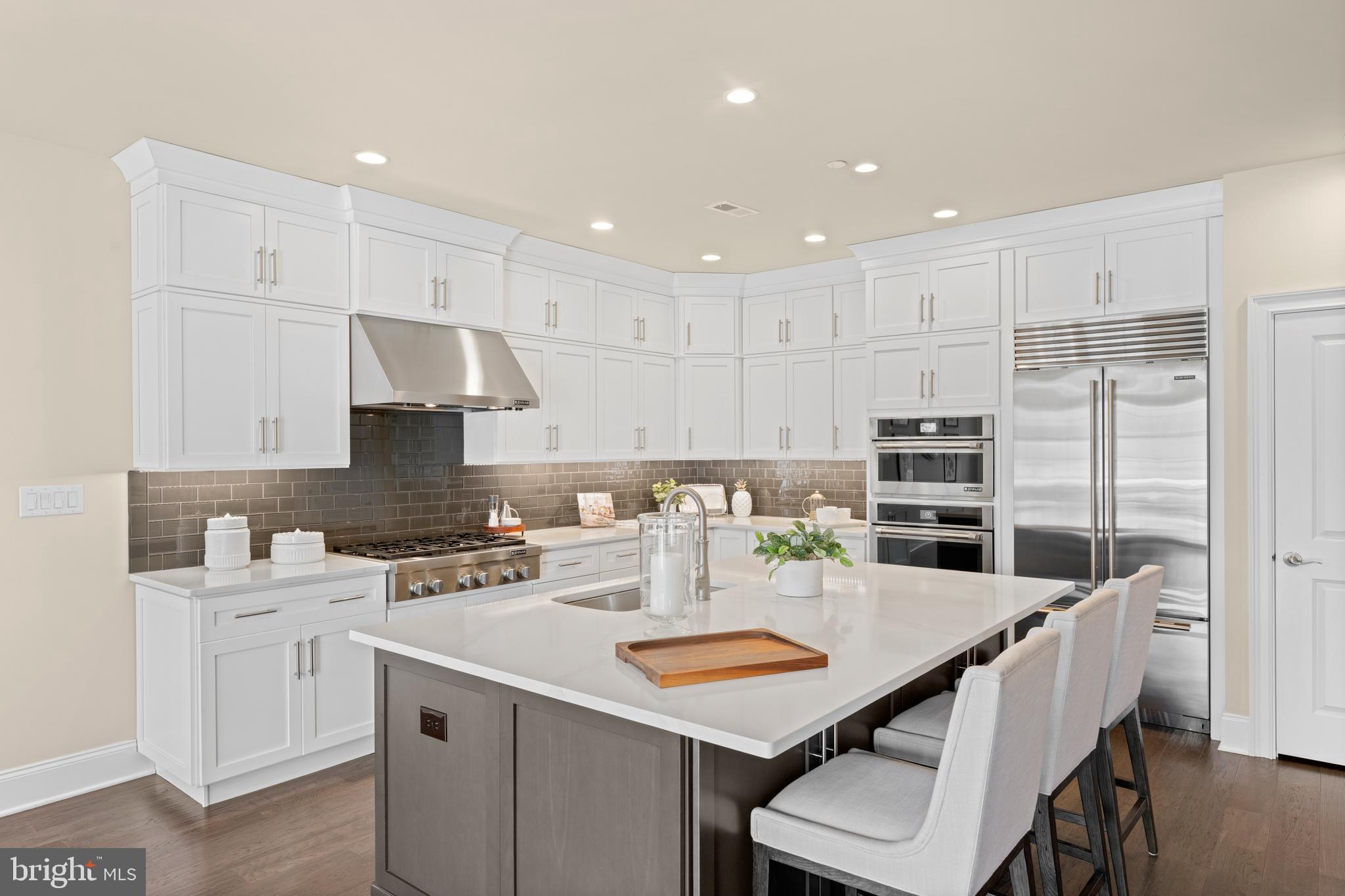 3860 Meadow View Farm Road Newtown Square, PA 19073 - Photo 12 of 40 a kitchen that has a table and chairs in it