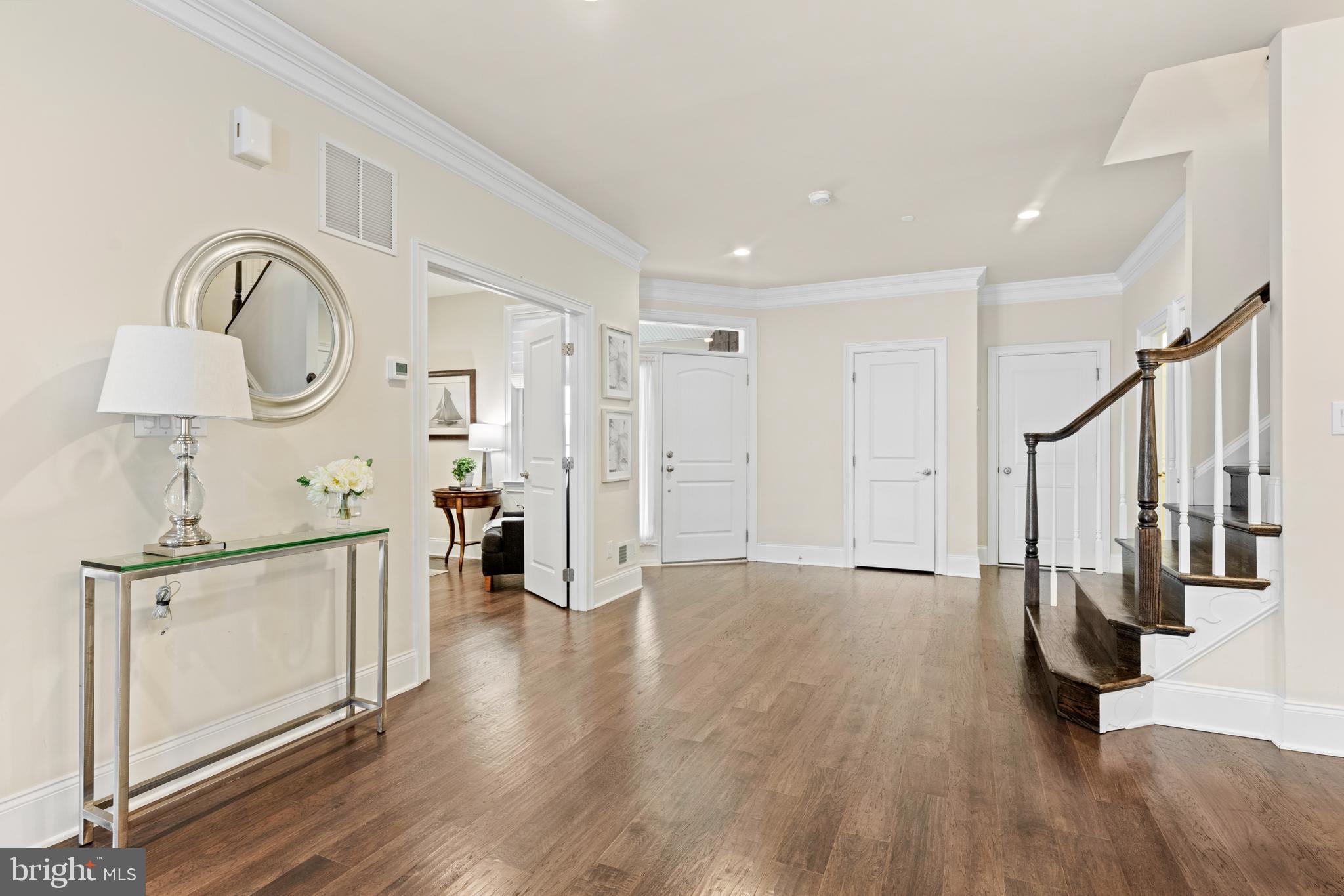 3860 Meadow View Farm Road Newtown Square, PA 19073 - Photo 17 of 40 a view of a hallway with wooden floor and staircase