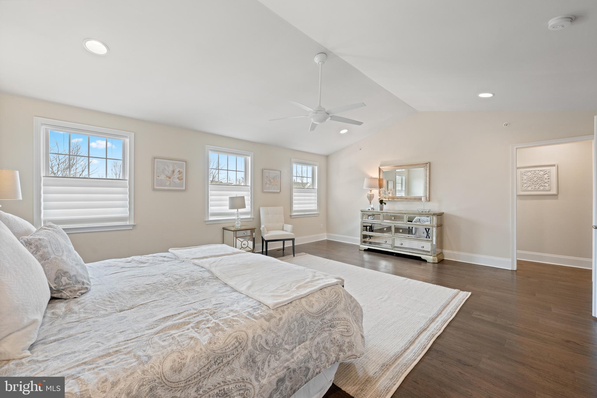 3860 Meadow View Farm Road Newtown Square, PA 19073 - Photo 24 of 40 a spacious bedroom with a bed and a couch