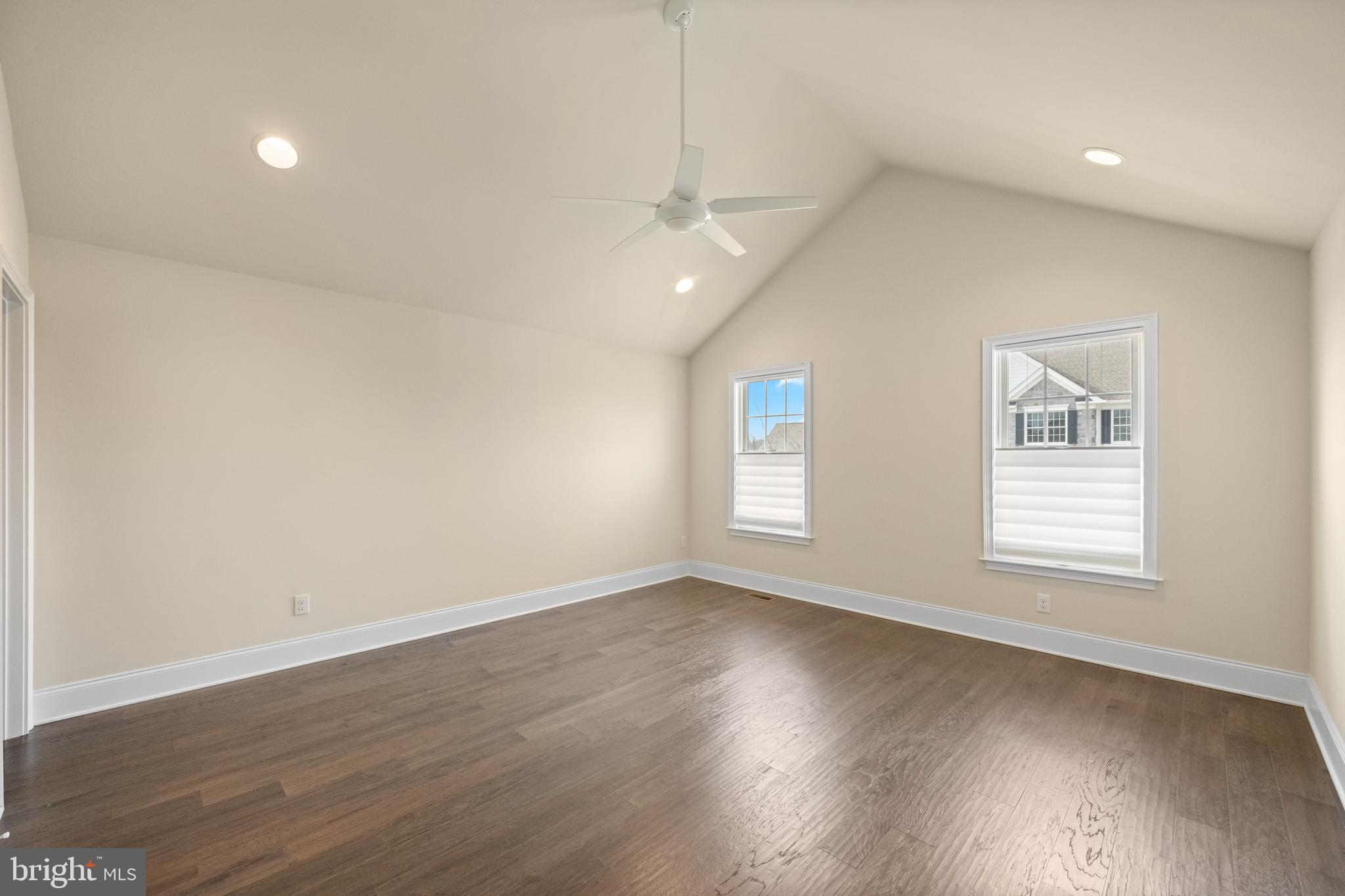 3860 Meadow View Farm Road Newtown Square, PA 19073 - Photo 32 of 40 an empty room with wooden floor and windows