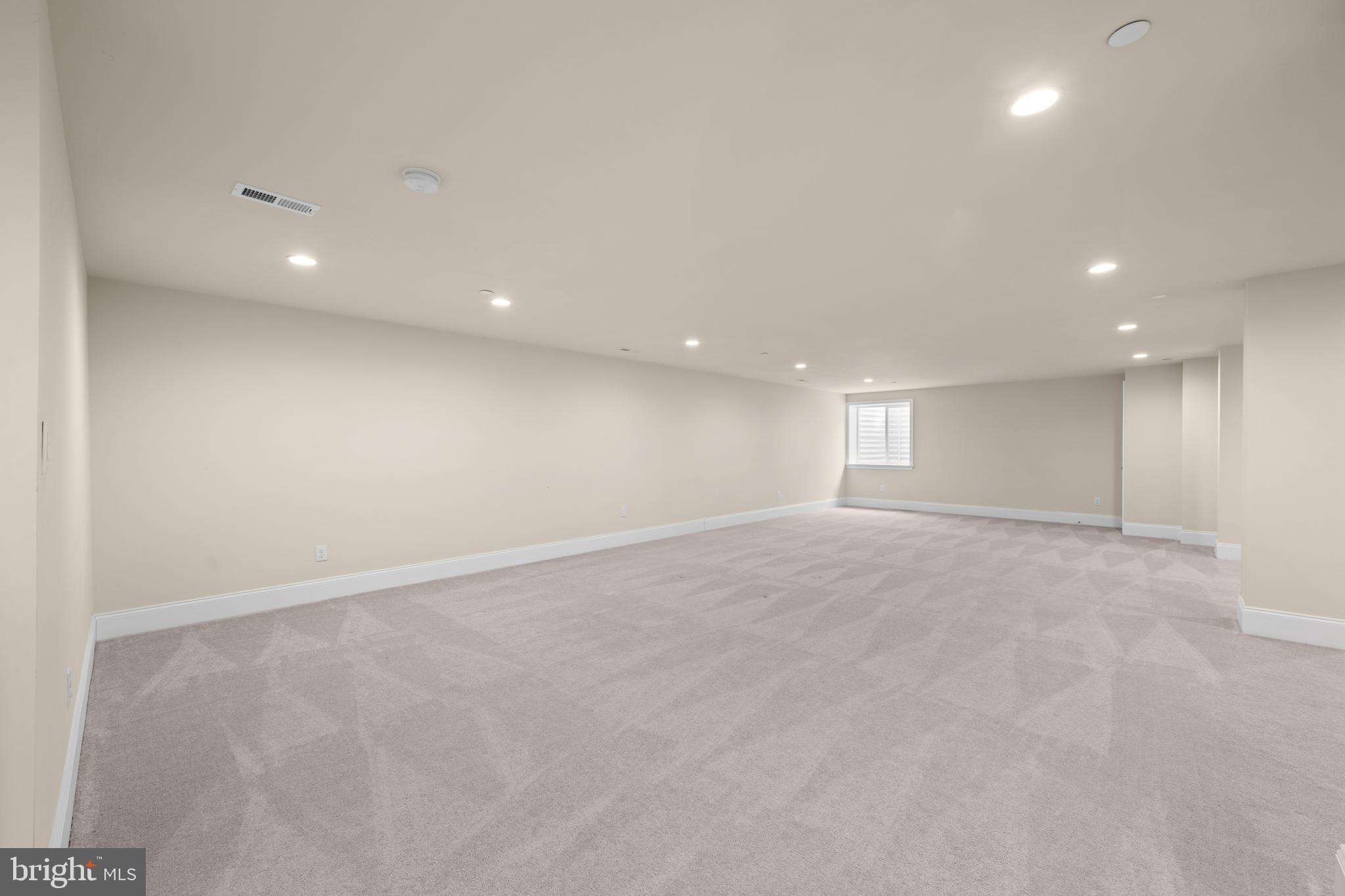 3860 Meadow View Farm Road Newtown Square, PA 19073 - Photo 37 of 40 an empty room with windows and pillars in it