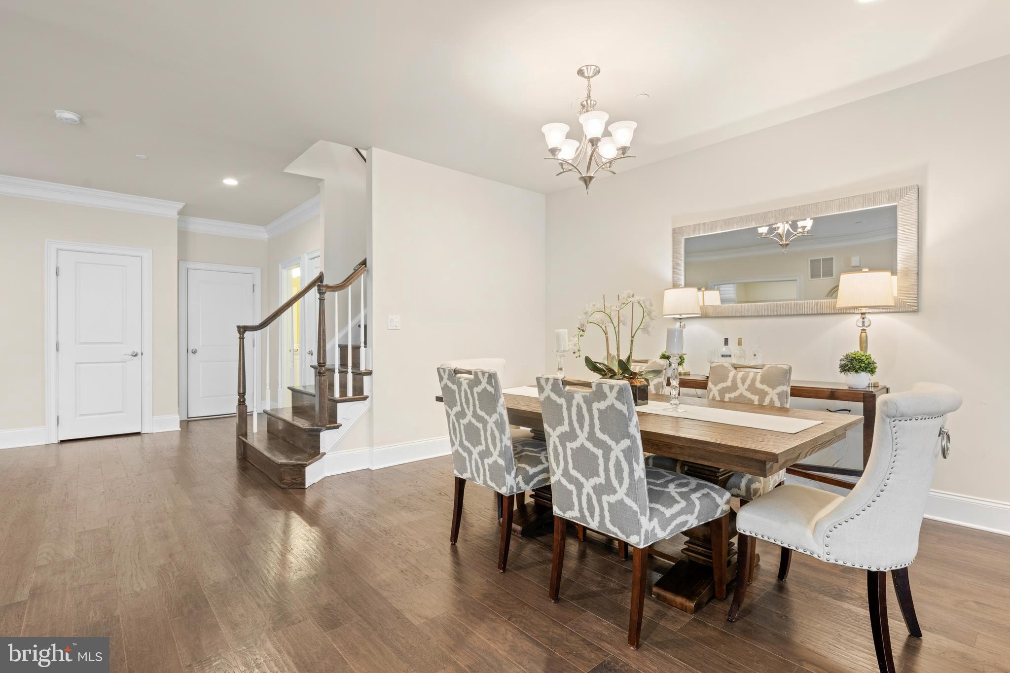 3860 Meadow View Farm Road Newtown Square, PA 19073 - Photo 7 of 40 a view of a dining room with furniture and wooden floor