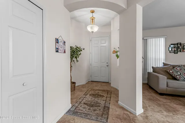 a bathroom with a tub and shower