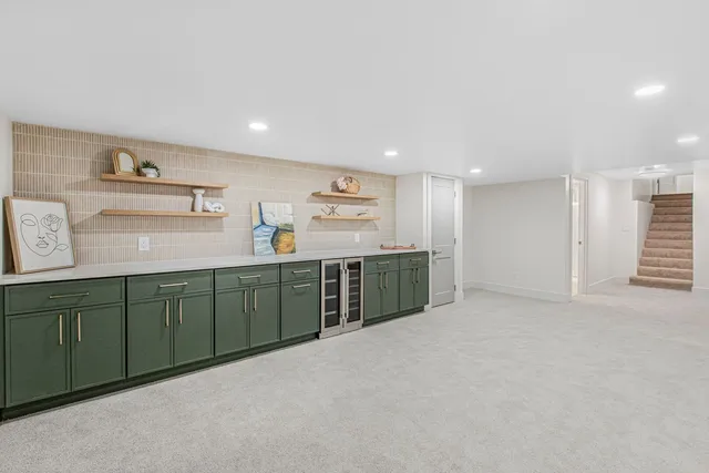 a view of a kitchen with furniture and window