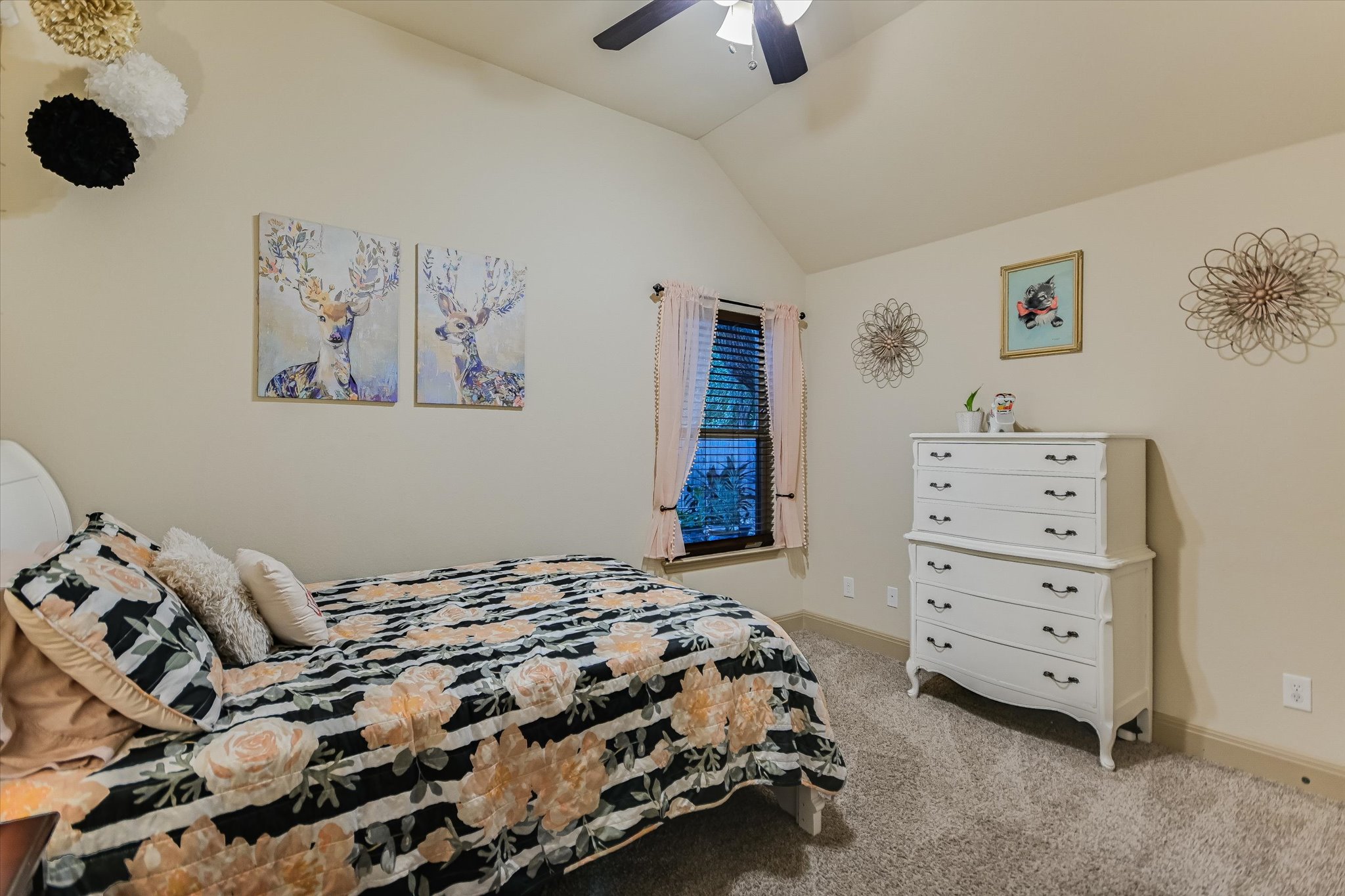 36 Ridgewood Circle Wimberley, TX 78676 - Photo 17 of 30 Vaulted ceilings and plush carpeting enhance this charming secondary bedroom space.