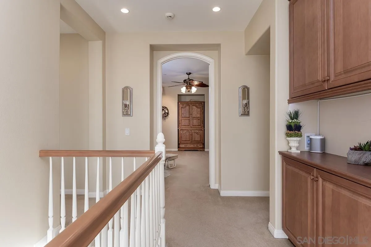 16333 Deer Ridge Road San Diego, CA 92127 - Photo 19 of 43 a view of a hallway to a livingroom and a hallway