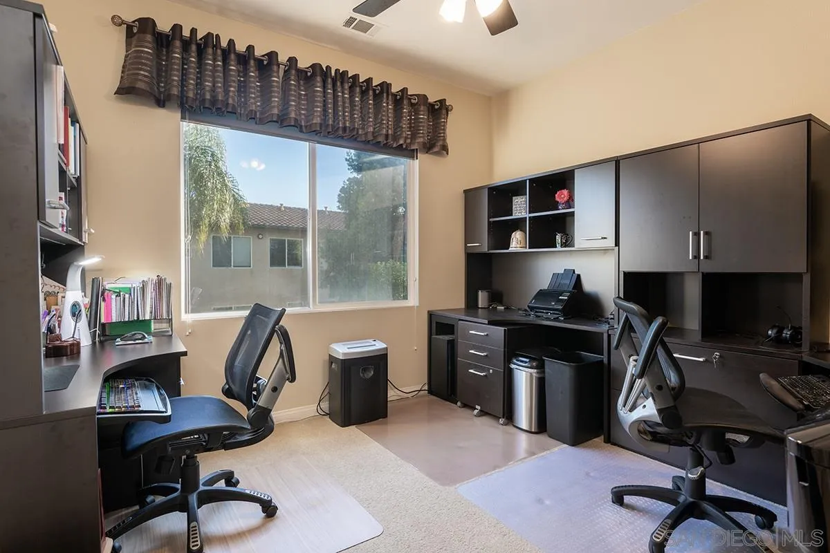 16333 Deer Ridge Road San Diego, CA 92127 - Photo 32 of 43 a view of a workspace with furniture and a window