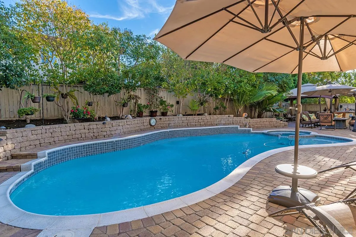 16333 Deer Ridge Road San Diego, CA 92127 - Photo 40 of 43 a view of a swimming pool with a patio